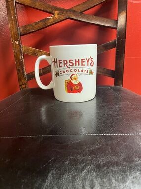 Hershey's White Ceramic Holiday Mug with Red Santa Graphic